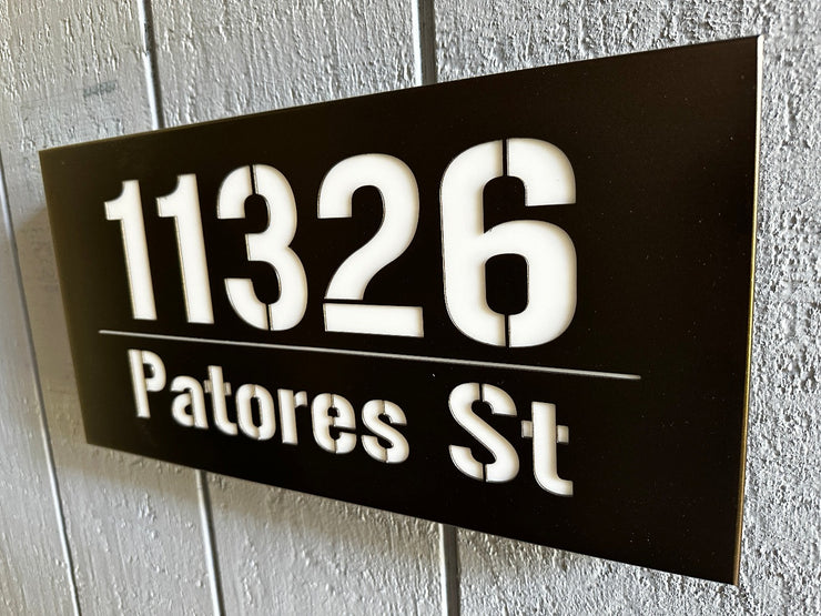 An illuminated Aluminum house sign that looks great during the day but truly shines at night with 46 LEDs and a dawn to dusk sensor - Antique Bronze finish
