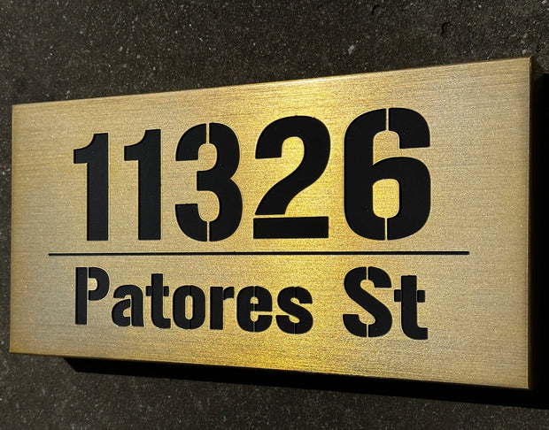 An illuminated Aluminum house sign that looks great during the day but truly shines at night with 46 LEDs and a dawn to dusk sensor - light Bronze finish