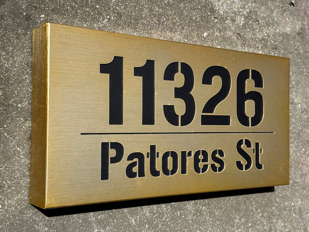 An illuminated Aluminum house sign that looks great during the day but truly shines at night with 46 LEDs and a dawn to dusk sensor - light Bronze finish