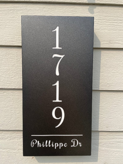 An illuminated Aluminum house sign that looks great during the day but truly shines at night with 46 LEDs and a dawn to dusk sensor - Black finish